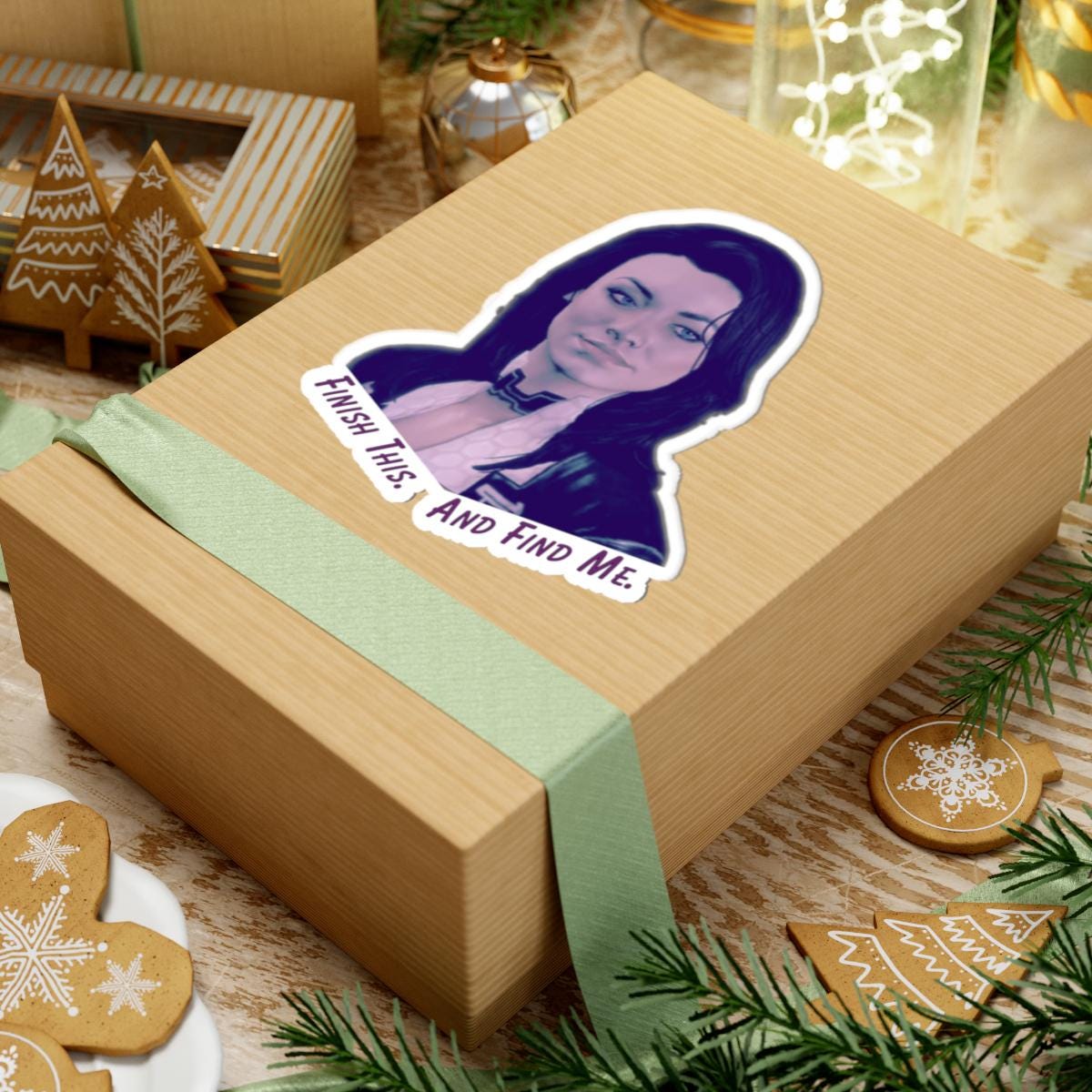 Vinyl sticker of Miranda Lawson from Mass Effect with the quote “Finish this. And find me.” in purple text on a white background.