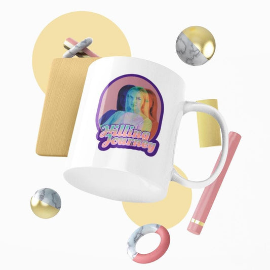White ceramic mug featuring a colorful triple-exposure image of Whitney Rose and the phrase “Hilling Journey” in retro lettering, referencing her famous RHOSLC quote.
